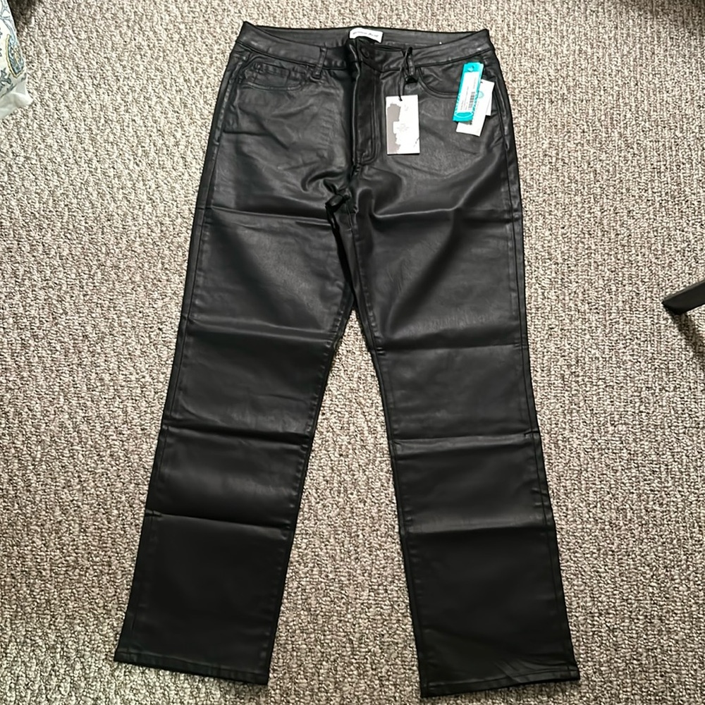 NWT Studio Black faux leather pants.